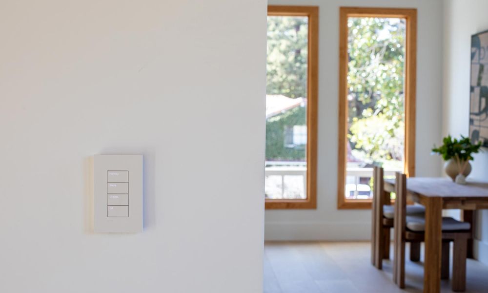 Smart switch labeled for hallway, stairs, and garage