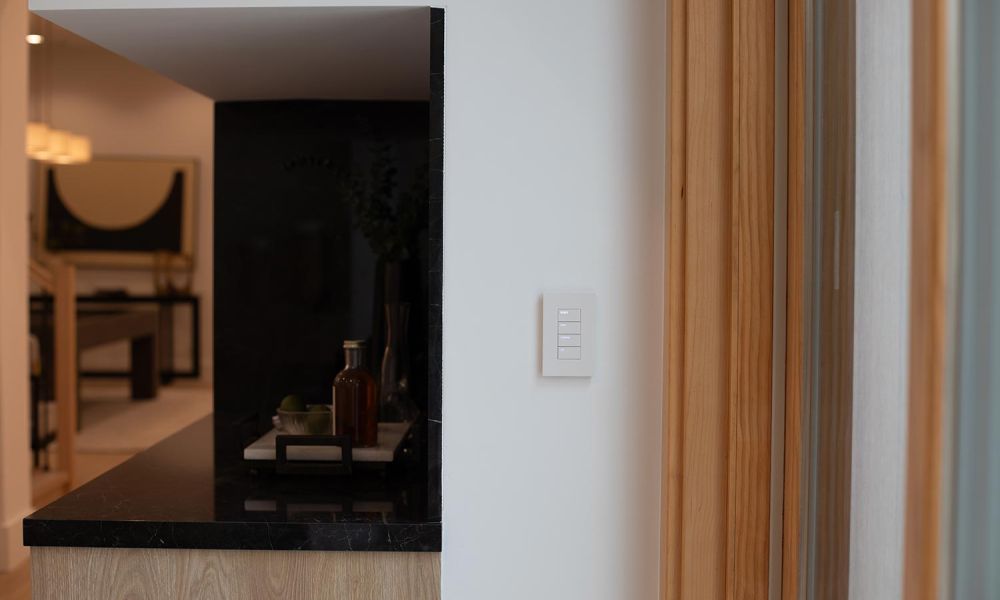 Smart switch near a bar area with black countertop